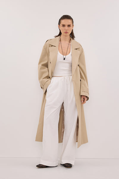 Stas wearing RHEA WHITE COTTON DRAWSTRING PANT