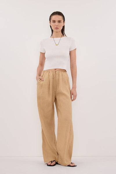 Stas wearing LUNE TAN LINEN PANT