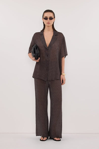 Stas wearing TIA CHOC MICRO CHECK PANT