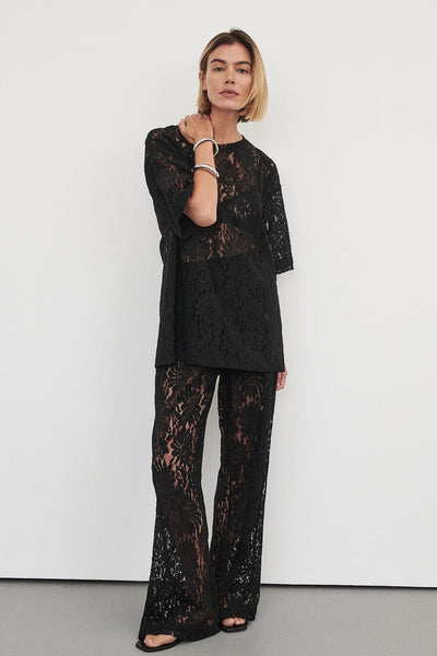 Joanna wearing WILMA BLACK LACE PANT