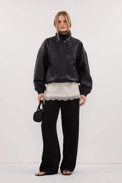 Zoe wearing ANDREA BLACK CUPRO LACE PANT
