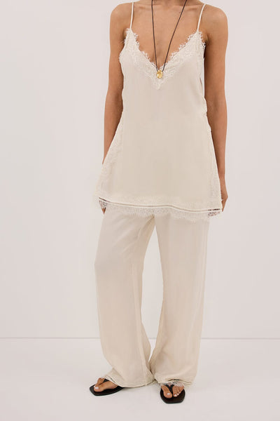 Stas wearing ANDREA SANDSTONE CUPRO LACE PANT