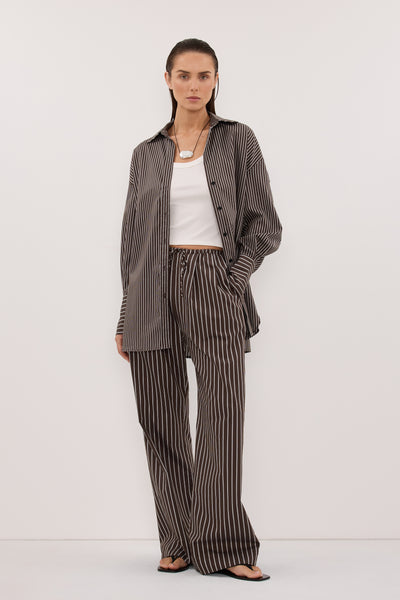 Stas wearing SABLE BITTER CHOC SILK BLEND PANT