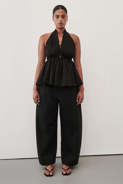 Amanda wearing SCOUT BLACK COTTON BARREL LEG PANT