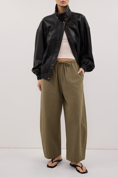 Stas wearing SCOUT KHAKI COTTON BARREL LEG PANT