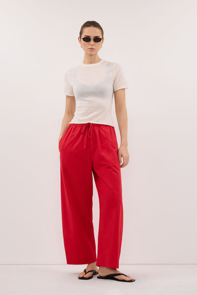 Stas wearing SCOUT RED COTTON BARREL LEG PANT