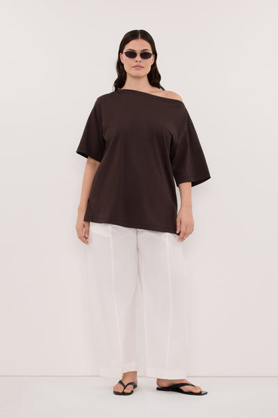 Jasmine wearing SCOUT WHITE COTTON BARREL LEG PANT