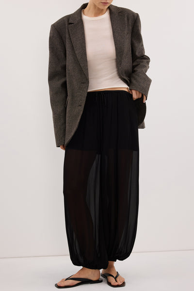 Stas wearing LUELLA BLACK BALLOON PANTS