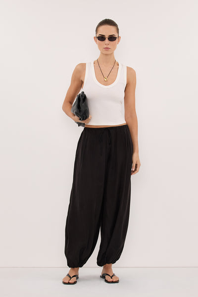 Stas wearing FRANCIS BLACK CUPRO BALLOON PANT