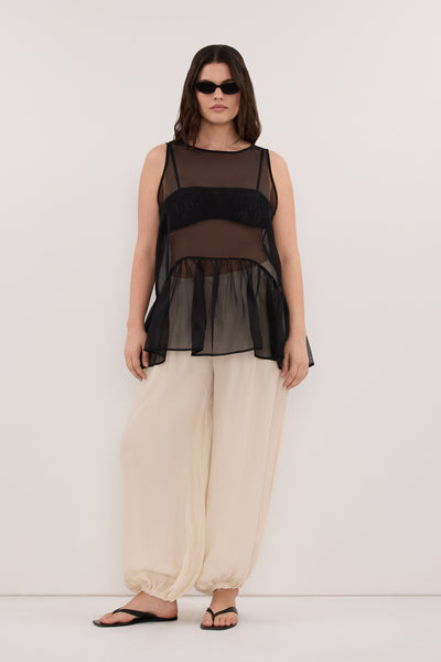 Zoe wearing FRANCIS SANDSTONE CUPRO BALLOON PANT