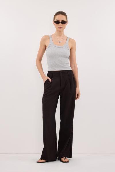 Stas wearing MONIQUE PEAT CHOC TAILORED PANT