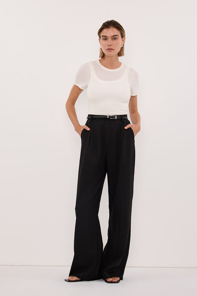 Joanna wearing CYRUS BLACK TAILORED PANT
