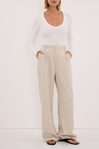 Joanna wearing CYRUS NATURAL TAILORED PANT