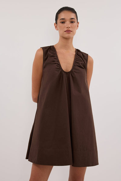 Casey wearing GABBY BITTER CHOC OVERSIZED COTTON MINI DRESS