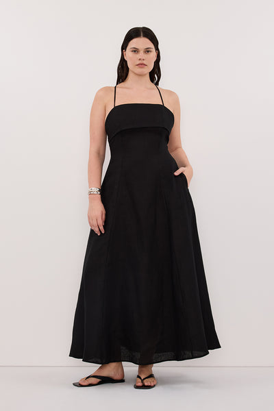 Jasmine wearing DANIELLA BLACK LINEN TIE BACK MIDI DRESS