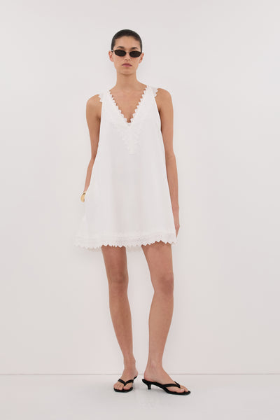 Aude wearing ANNABEL WHITE SLEEVELESS V NECK MINI DRESS