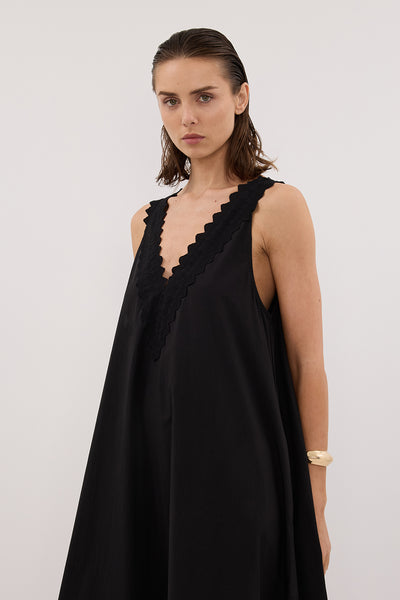 Stas wearing ANNABEL BLACK SLEEVELESS V NECK MIDI DRESS