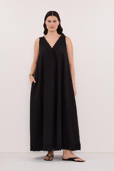 Jasmine wearing ANNABEL BLACK SLEEVELESS V NECK MIDI DRESS