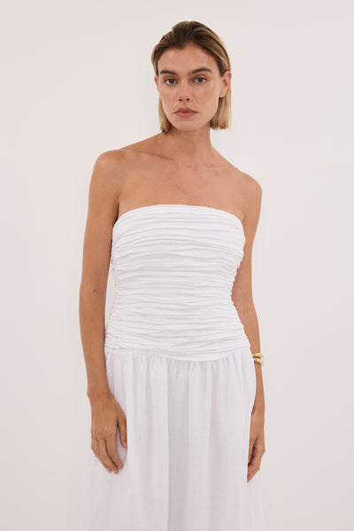 Joanna wearing AUBRIELLA WHITE LINEN MIDI DRESS