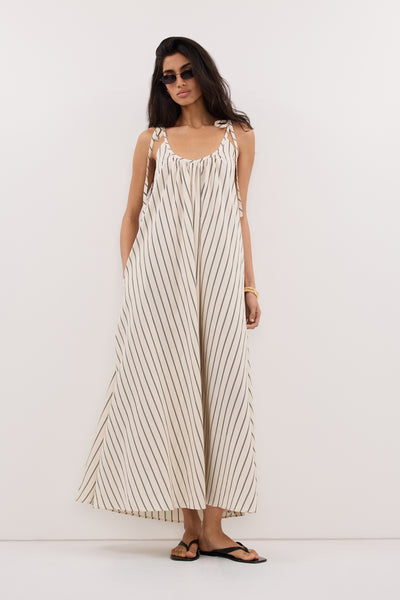 Anaya  wearing FABLE CREAM STRIPE MIDI DRESS