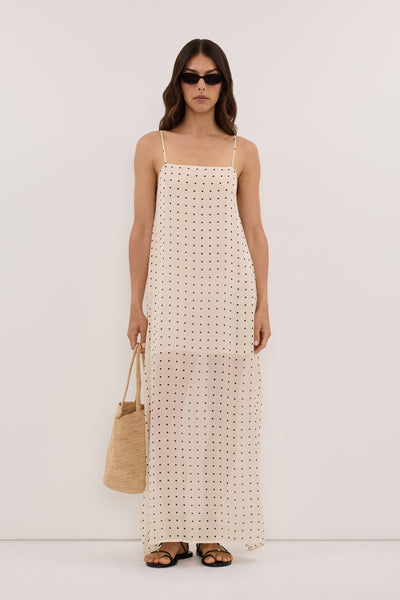 Helena  wearing VANESSA SANDSTONE SLEEVELESS MIDI DRESS