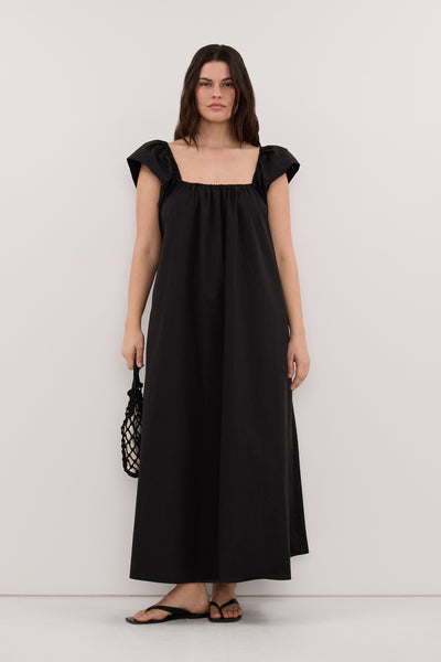 Jasmine wearing KATE BLACK COTTON MIDI DRESS