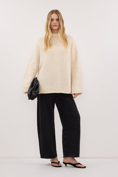 Zoe wearing MILLY CREAM CREW NECK KNIT JUMPER