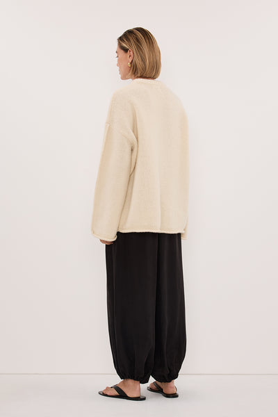 Joanna wearing MILLY CREAM CREW NECK KNIT JUMPER