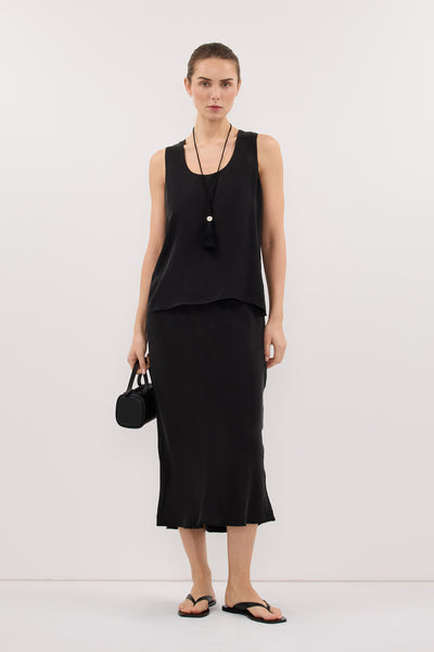 Stas wearing PALORA BLACK CUPRO TOP