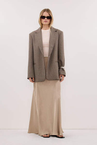 Zoe wearing JULIETTE GOLD SILK MIDI SKIRT