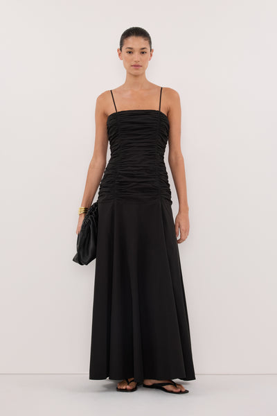 Aude wearing CARA BLACK SLEEVELESS COTTON MIDI DRESS