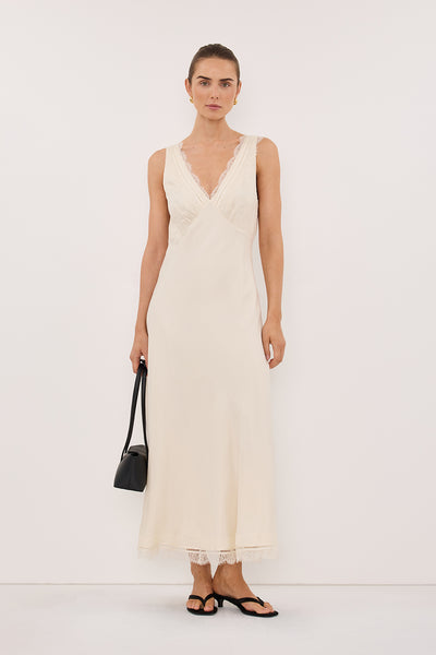 Stas wearing ANDREA SANDSTONE CUPRO MIDI DRESS