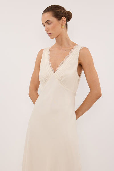 Stas wearing ANDREA SANDSTONE CUPRO MIDI DRESS