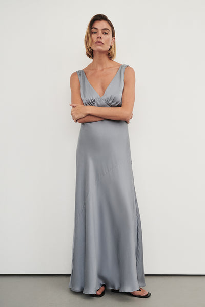 Joanna wearing MILA DUSTY BLUE SILK MIDI DRESS