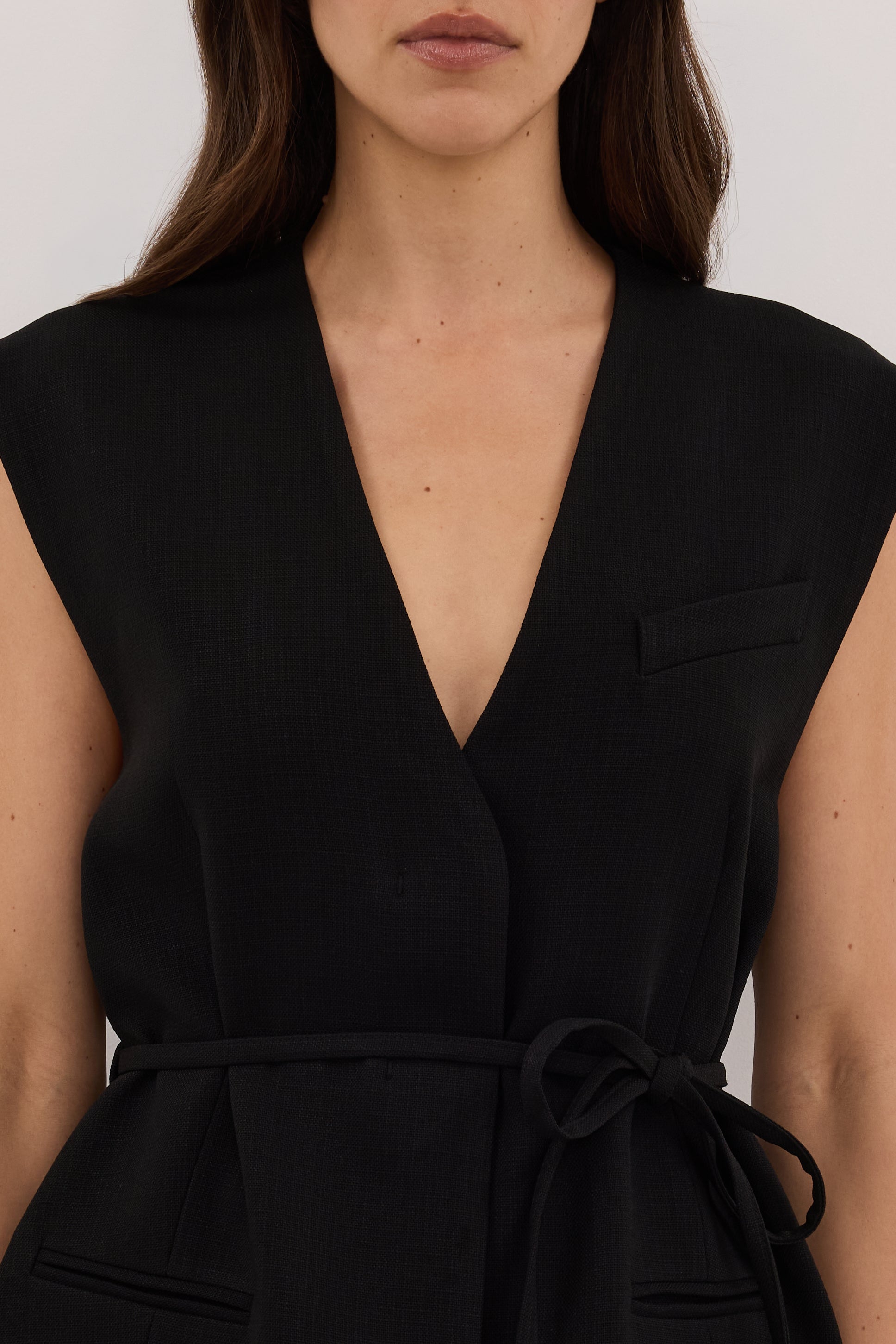EMORY BLACK COLLARLESS PEPLUM VEST