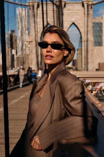 Joanna wearing HAILEY CHOC OVERSIZED STRIPE TIE BLAZER