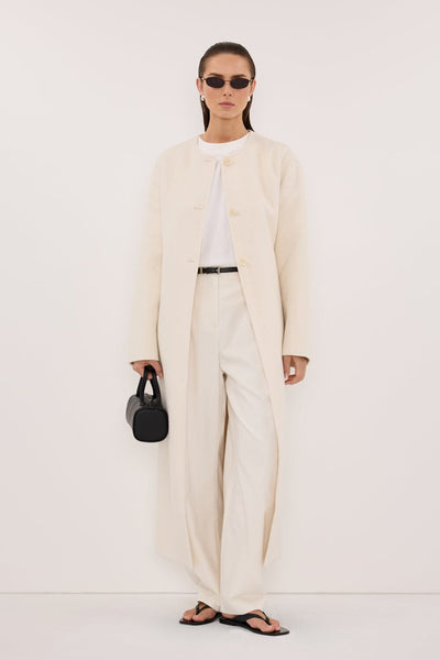 Stas wearing GRETA OFF WHITE COLLARLESS WOOL BLEND COAT