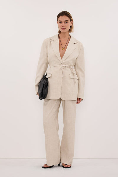 Joanna wearing CYRUS NATURAL OVERSIZED TIE WAIST BLAZER