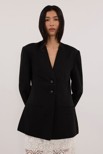 Zoey wearing ROSALIE BLACK CINCHED BLAZER