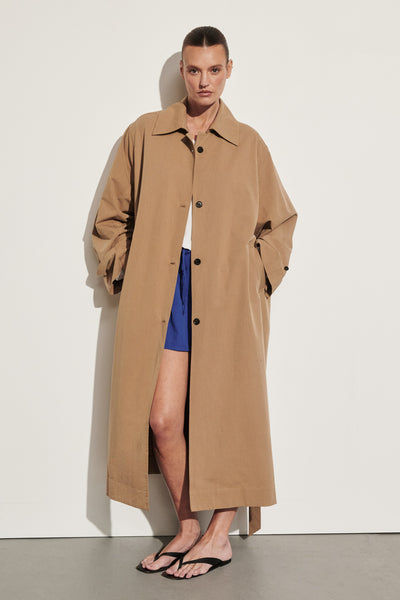 Montana wearing KAELA TAN LIGHTWEIGHT TRENCH COAT