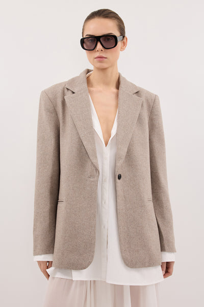 Stas wearing AINSLY OAT TEXTURED BLAZER