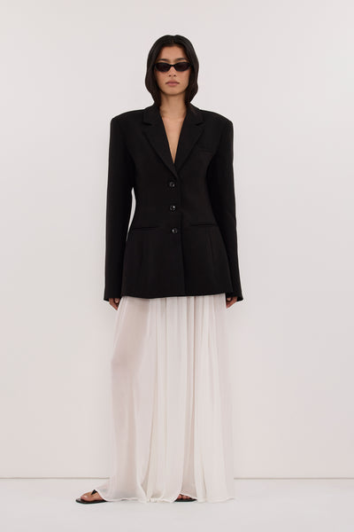 Zoey wearing CHIARA BLACK CINCHED BLAZER