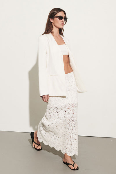 Sofia wearing GIULIA IVORY COLLARLESS BLAZER