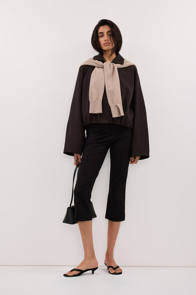 Anaya  wearing SIAN PEAT PINSTRIPE BOMBER JACKET