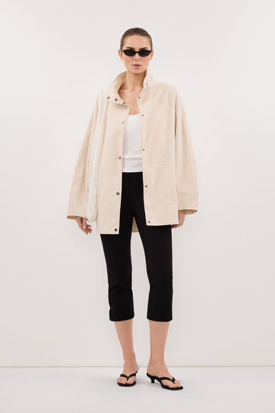 Stas wearing MARIS OYSTER MID LENGTH JACKET