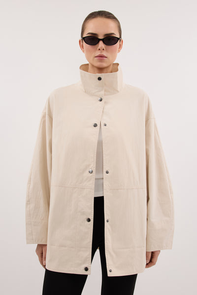Stas wearing MARIS OYSTER MID LENGTH JACKET