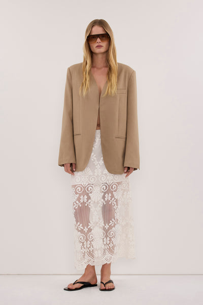 Zoe wearing HALINA WHEAT COLLARLESS BLAZER