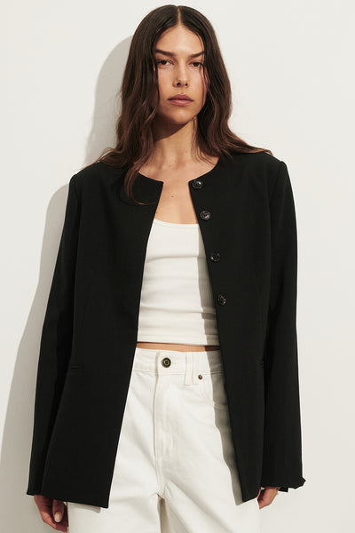 Helena  wearing CHIARA BLACK COLLARLESS BLAZER