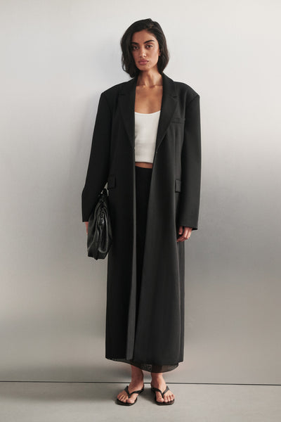 Anaya  wearing VIDA BLACK LONGLINE BLAZER COAT