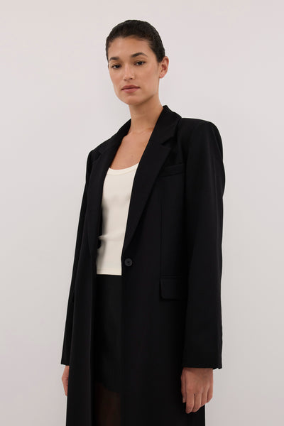 Aude wearing VIDA BLACK LONGLINE BLAZER COAT